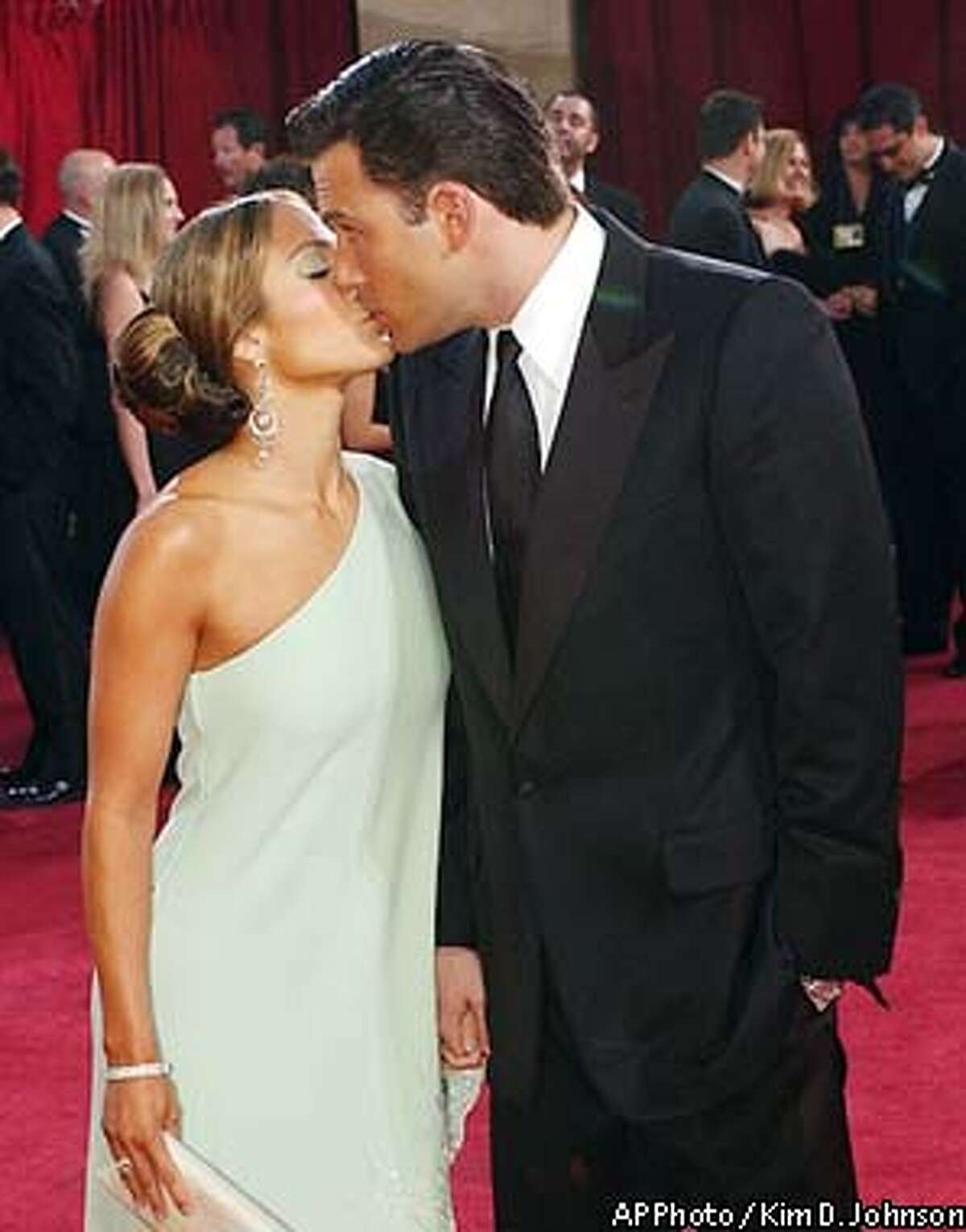 Actors Jennifer Lopez and her fianc Ben Affleck kiss during their arrival for the 75th annual Academy Awards Sunday, March 23, 2003, in Los Angeles where they will be presenters during the show. (AP Photo/(AP Photo/Kim D. Johnson)