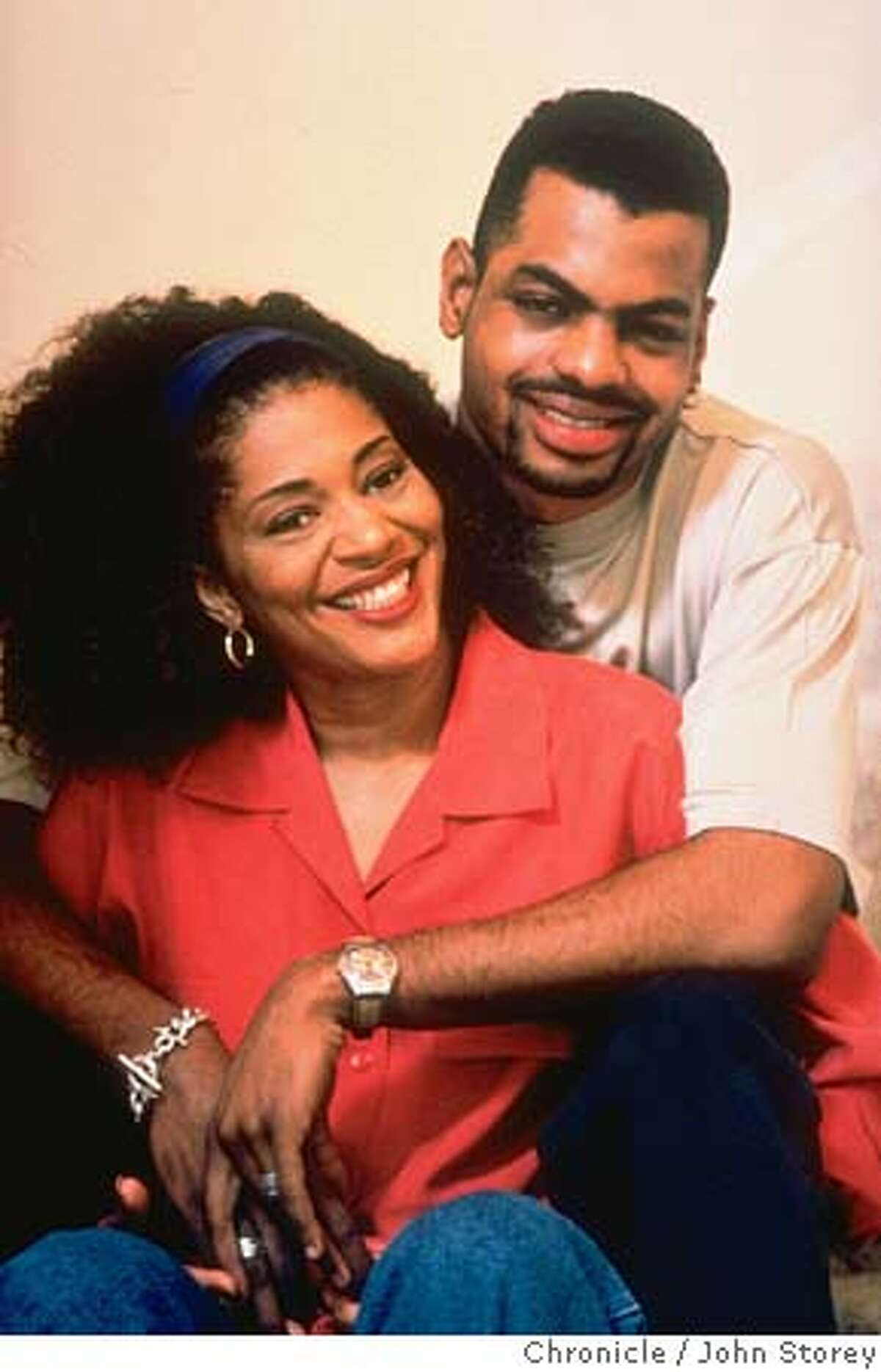 Caption for M&R story 6/26/05: Author Terry McMillan and husband Jonathan Plummer in happier times. Original caption from 1996: Author Terry McMillan, 44, cuddling with her 21-yr-old live-in lover, college student Jonatahan Plummer. (Photo by John Storey//Time Life Pictures/Getty Images)