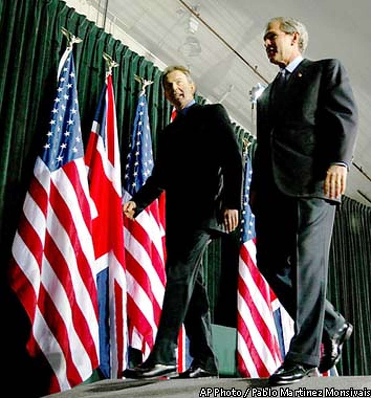 Leaders put up united front / Bush, Blair put up united front / Bush