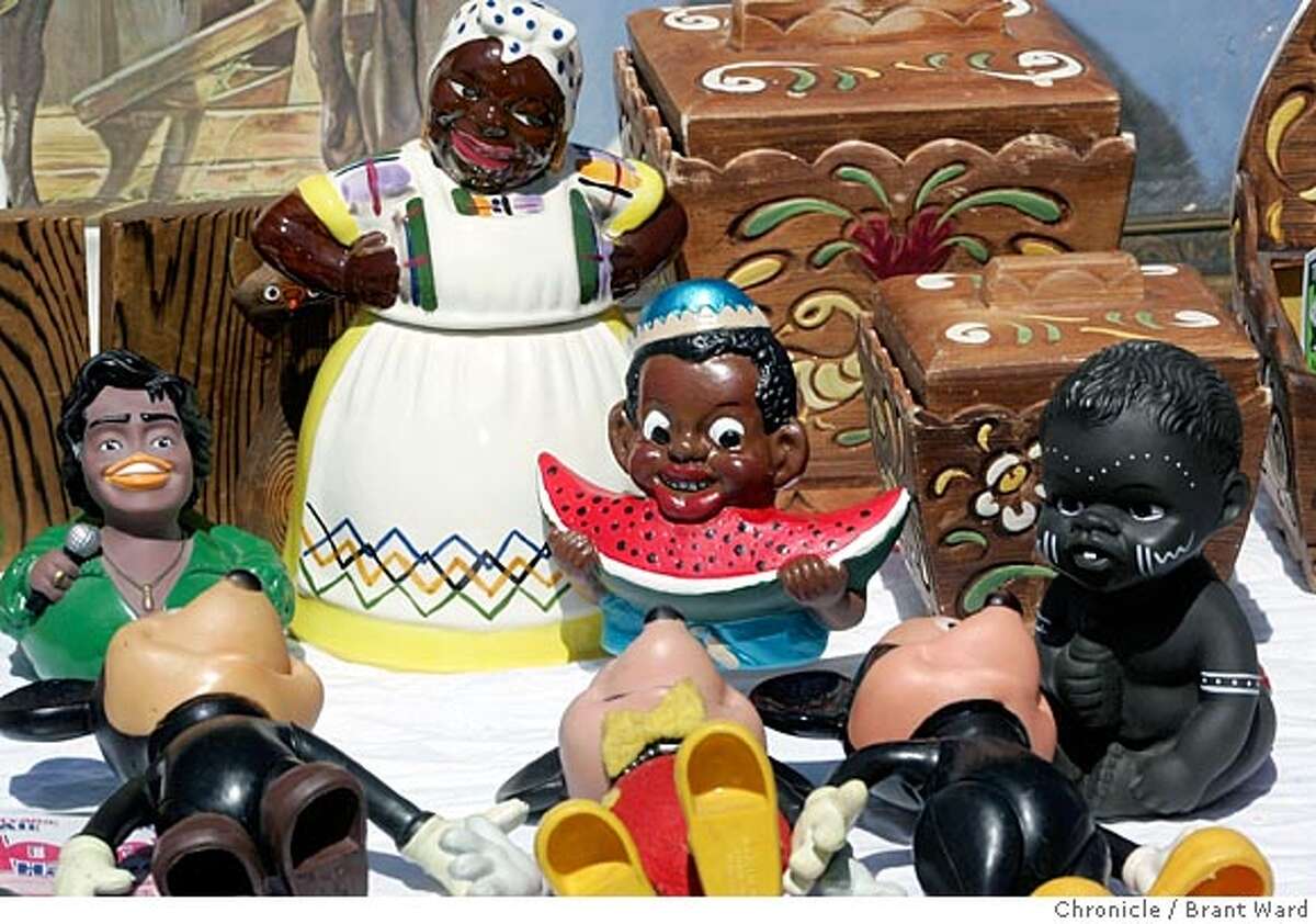 A collection of African American figurines at their stand. Jan Faulkner and Renita Pines sell antique memorabilia of African Americans at the Alameda Antiques Flea Market on Sundays. Brant Ward 6/6/05