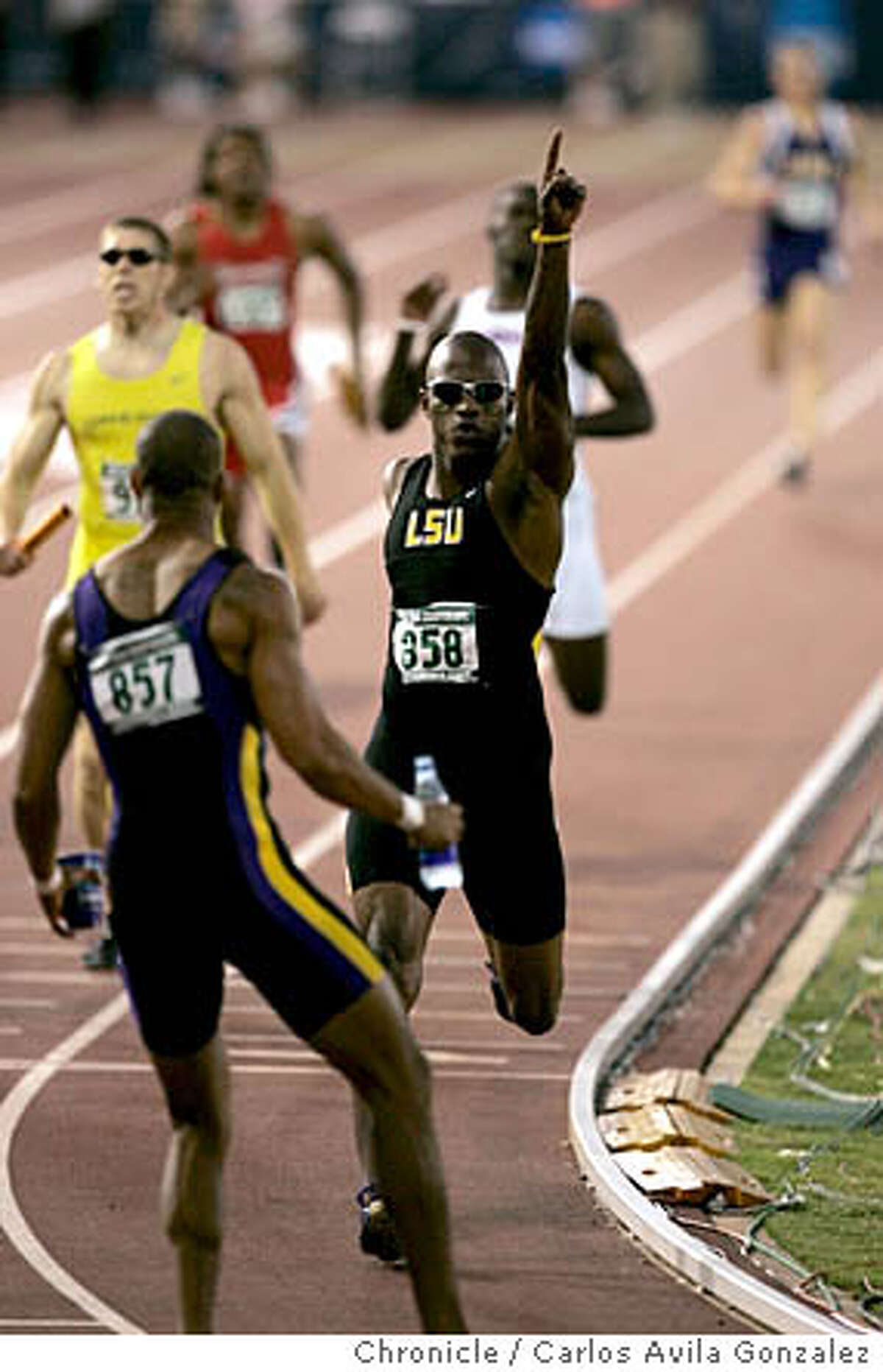 NCAA TRACK AND FIELD Division I Championships / Hall beats teammate in