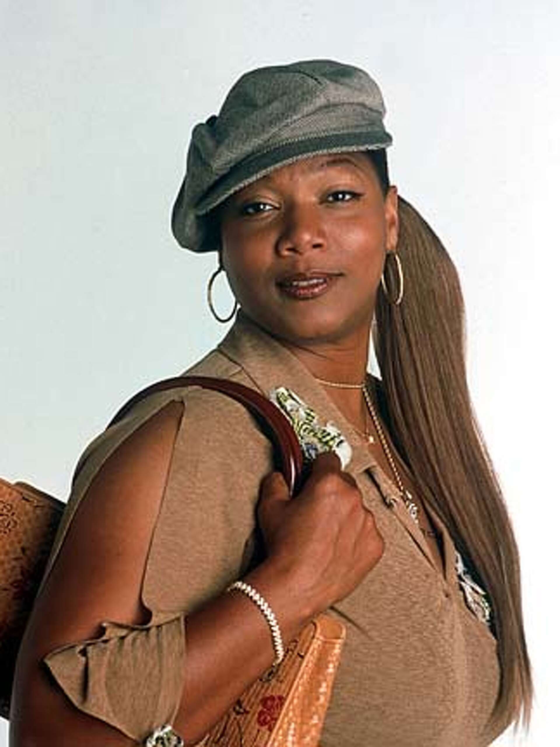 Oscar-nominated Queen Latifah takes charge in 'Bringing Down the House', image size:1920x2560