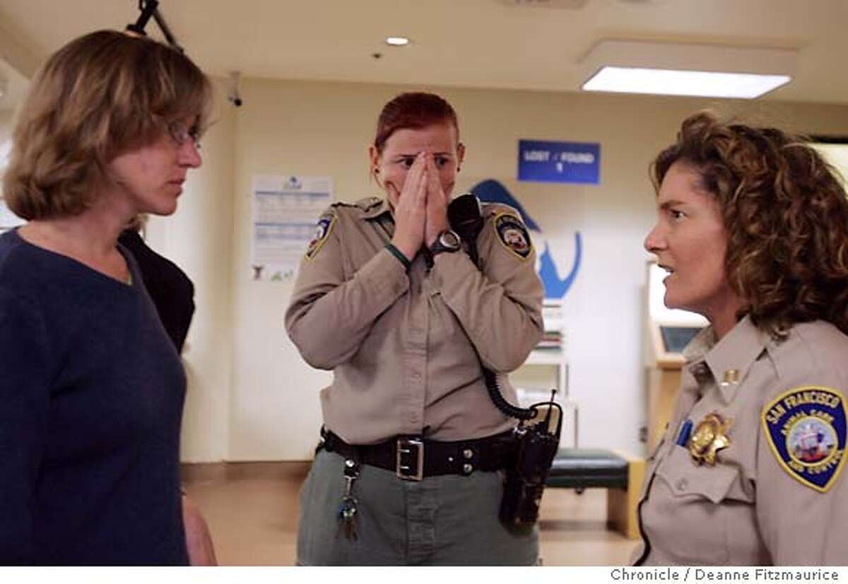 After being some of the first to arrive on the scene, Animal Control officers Elllie Sadler (center) and Vicky Guldbech (right) describe the scene to dog behaviorist Donna Duford (left) moments after they return to San Francisco Animal Care and Control with dog named Rex who is brought in a cage to San Francisco Animal Care and Control after being found at the scene of a fatality where a boy named Nicholas Scott Faibish was mauled. San Francisco Chronicle/ Deanne Fitzmaurice