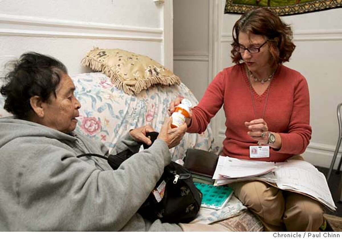 sfbudget09_003_pc.jpg Ellen Sakoloff (right) helps Esperanza Leon keep track of ten different prescription drugs she needs to take. Public health nurse Ellen Sakoloff visits patient Esperanza Leon at her Mission district home on 12/8/04 in San Francisco, CA. Cuts in the city's budget could slash the number of public health nurses that make regular in-home visits. PAUL CHINN/The Chronicle MANDATORY CREDIT FOR PHOTOG AND S.F. CHRONICLE/ - MAGS OUT