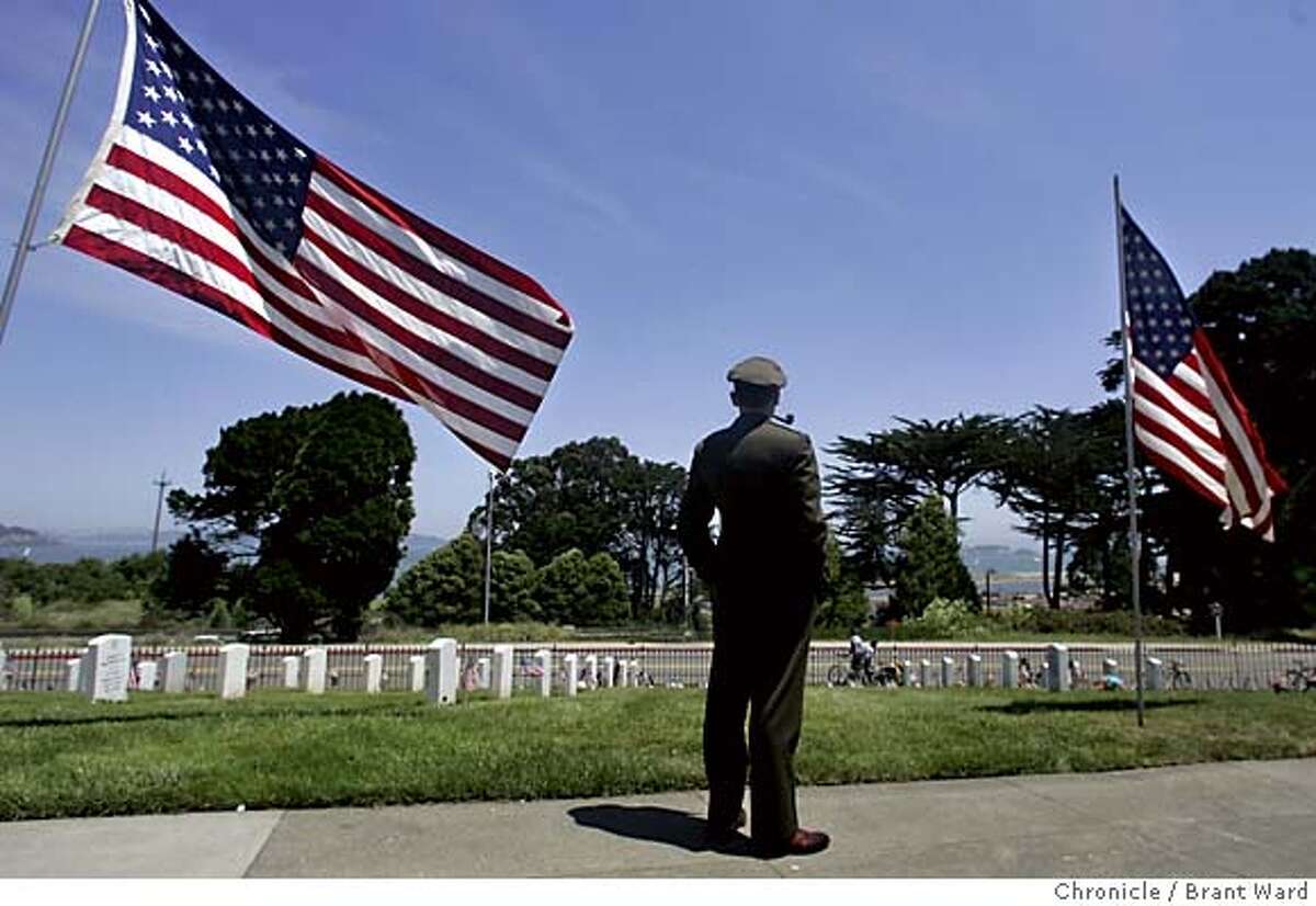 memorial689_ward.jpg John Stokes struck a pose his grandfather would be proud of as he looked north towards the bay. John wore his grandfather's US Army Air Corp uniform to Memorial Day services to honor his memory Monday. Memorial Day ceremonies were held once again at the San Francisco National Cemetery at the Presidio. Pleasant weather helped bring out about 2000 people to this years event. The cemetery measures about 27 acres and contains over 30,000 graves. Brant Ward 5/31/05