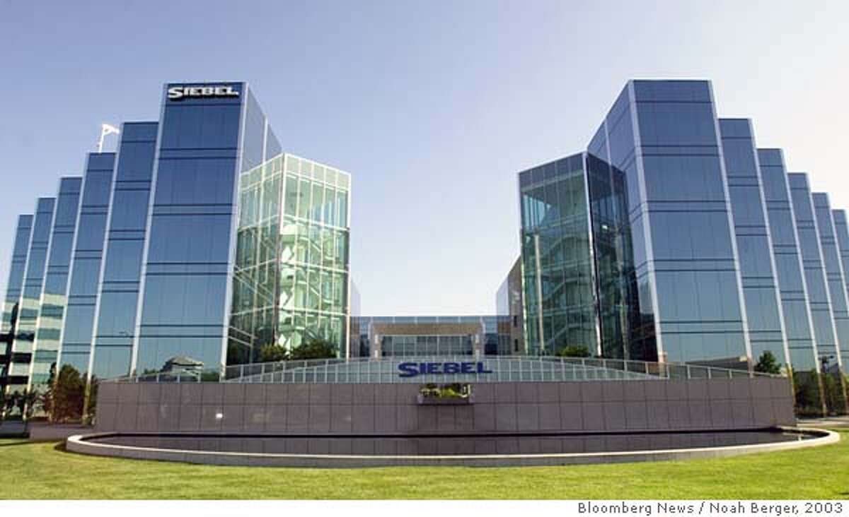 The headquarters building of Siebel Systems is seen in San Mateo, California on Thursday, July 3, 2003. Siebel Systems Inc., the world's largest maker of customer-service software, said second-quarter profit and sales fell more than forecast as customers spent less amid a ``turbulent'' business-software market and weak economy. Photographer: Noah Berger/Bloomberg News. Ran on: 04-14-2005 Siebel Systems, located in San Mateo, says first-quarter profit and sales on its customer service software are below expectations.