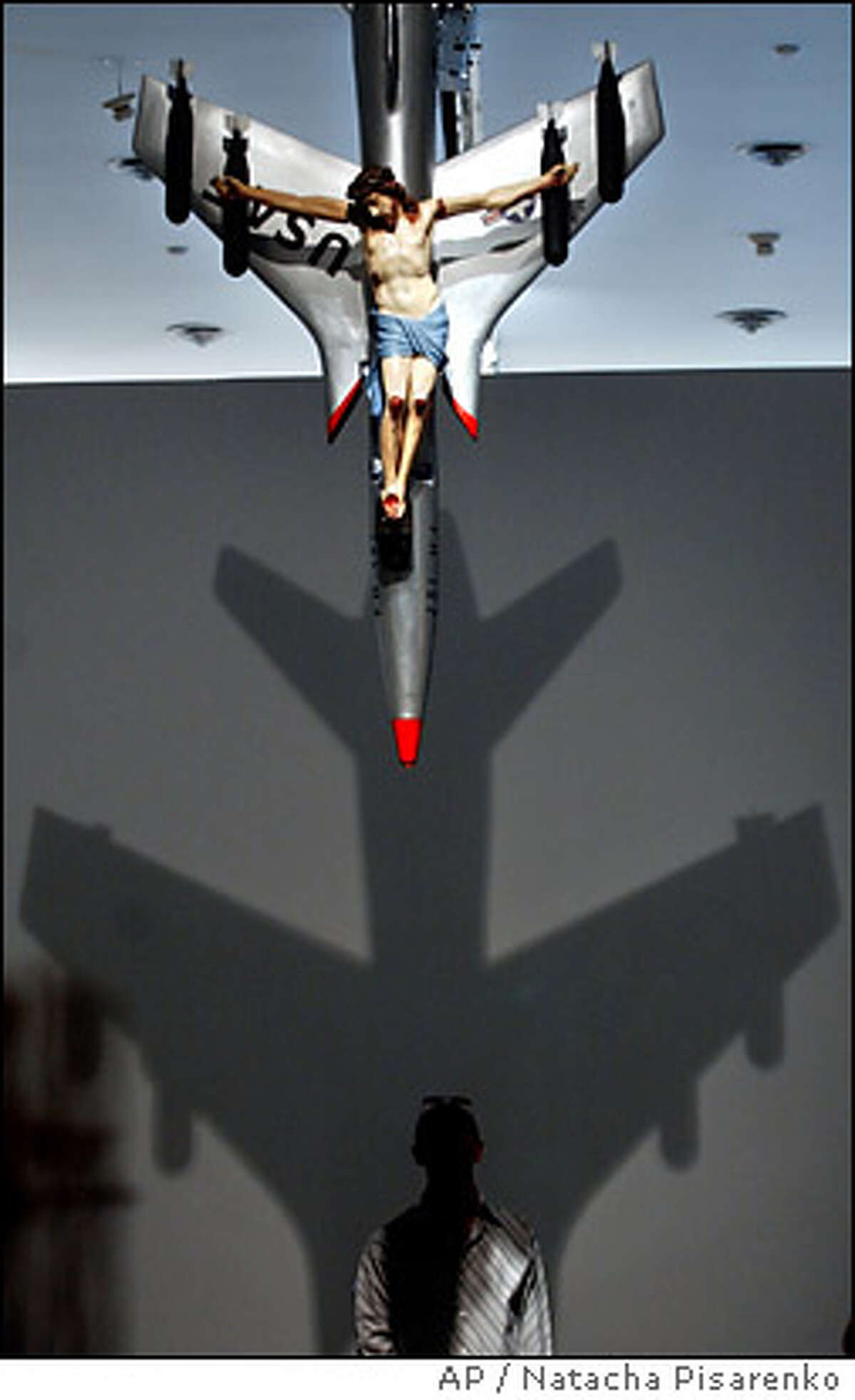 Argentine artist Leon Ferrari was known for works such as this figure of Christ crucified on a U.S. combat plane that often sparked controvery. Jorge Mario Bergoglio, before he became Pope Francis, tried to shut down an exhibit of his work. A judge agreed, but a different judge later overturned the decision. Source: Religion News Service
