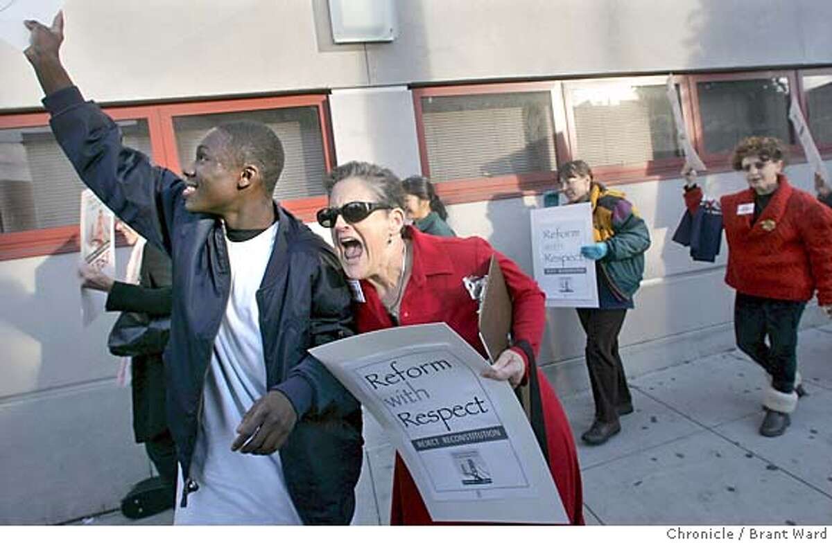 protest158_ward.jpg Retired teacher Hene Kelly and O'Connell student Jonathon McNair, 14, got into the spirit of the protest chanting together in front of the school. The San Francisco teacher's union stages a protest in front of John O'Connell High School Tuesday afternoon decrying the requirement that teachers working in the new Dream schools reapply for their jobs. Brant Ward 12/1/04 Metro#Metro#Chronicle#12/1/2004#ALL#5star##0422493176