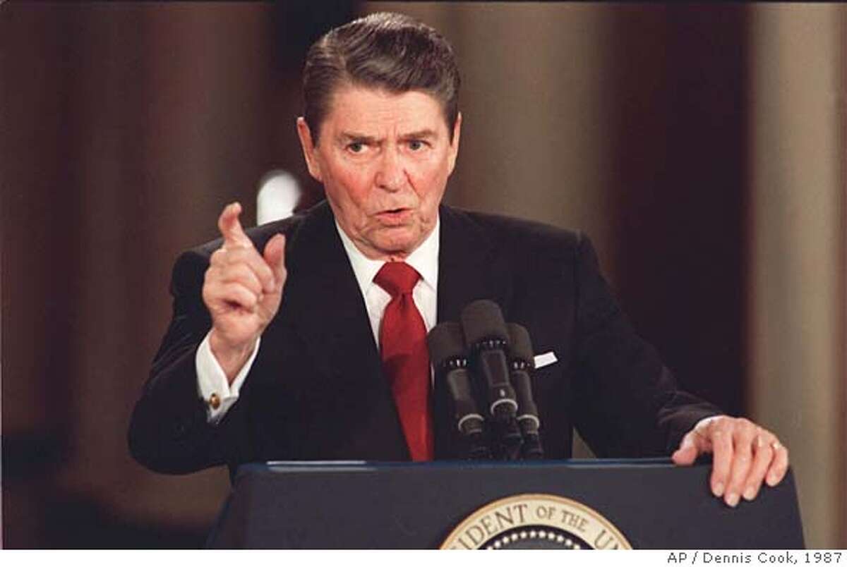 ** FILE ** President Reagan gives a news conference at the White House March 20,1987. Reagan said he never deliberately lied to the public, although he admitted to a misstatment about Israeli involvement in the Iran-Contra affair. Reagan died Saturday, June 5, 2004 at his home in California, according to a friend, who spoke on condition of anonymity. He was 93. (AP Photo/Dennis Cook) Ran on: 06-13-2004 President Ronald Reagan and his handlers deftly used the news media to get out his message and avoid tough scrutiny.