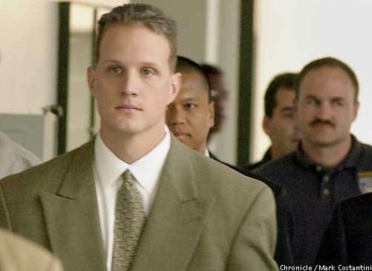 RIDERS07b-C-06DEC00-EZ-MC. Matt Hornung, an Oakland cop and part of a group known as "The Riders," leaves Alameda County Superior Court in Oakland today. Photo by Mark Costantini/Chronicle ALSO RAN 5/31/2001