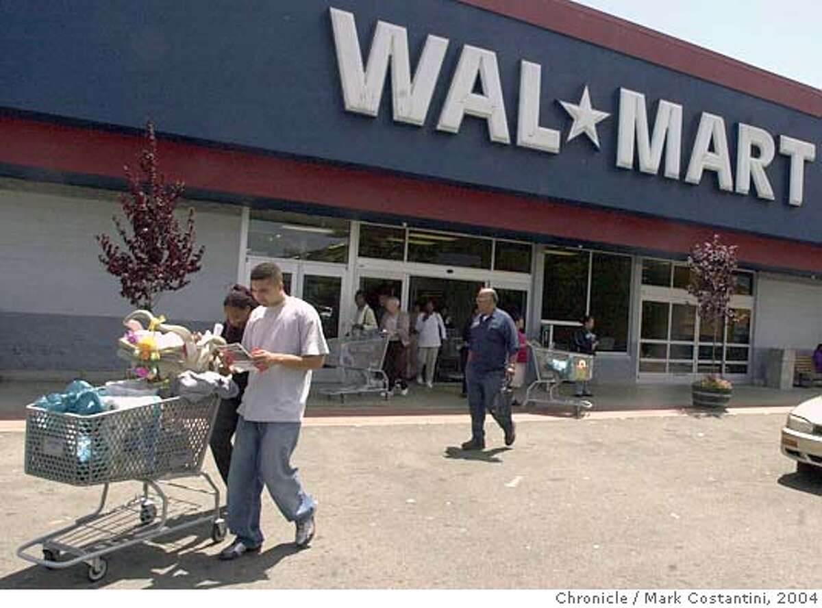 WALMART_008.JPG Photo taken on 6/23/04 in San Leandro. Shoppers leave Walmart. The discount retail chain is named in a large class action lawsuit. These particular shoppers declined to be identified. Photo: Mark Costantini/SF Chroniclerial