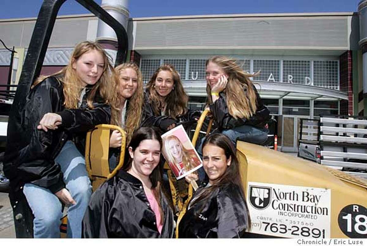 0021_superbseven16_el.JPG In front of the new theater still under construction the girls huddled atop a construction pavement roller. Front Row; Liza Hall,16 and Elizabeth Comstock,15. Back Row; Noelle Bisson,16, Sarah Marcia,16, Ashley Ditmer,16, and Taylor Norman,16. The photograph is of Madison Webb,16, who had moved ways but was a big part of the process. Seven teenage girls pressed local politicians, developers and movie theatre chains to build a theatre in downtown Petaluma, whose cinemas had been shut down. The new multiplex opens next week, with a ribbon cutting ceremony on Tuesday. Event on 5/16/05 in Petaluma. Eric Luse / The Chronicle Ran on: 05-17-2005 The Superb Seven: In the front row, Liza Hall, left, and Elizabeth Comstock. Behind them, No�lle Bisson, left, Sarah Marcia, Ashley Ditmer and Taylor Norman. The picture is of Madison Webb.