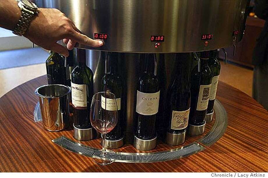 Pushbutton pours / Retail wine 'automat' lets customers dispense their