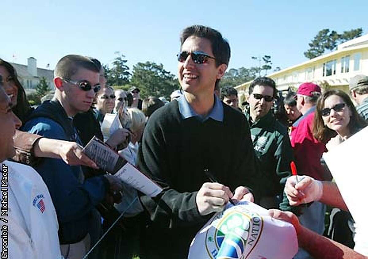 Actor Ray Romano signs autographs as he makes his way to the 1st tee for the challenge. 3M Celebrity Challenge took place today at Pebble Beach Golf lInks. by Michael Macor/The Chronicle