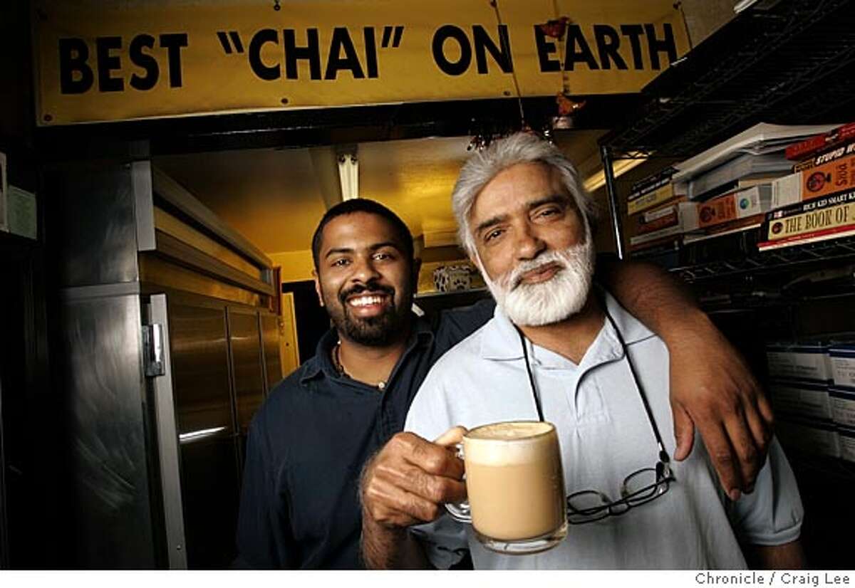 Photo of Raman Belchar (right) and his son, Raj, with a cup of Chai. The real Chai. The drink is all over coffee houses, and new products keep debuting to make it at home, but none compare to the one and only chai at Coastside Gourmet Coffee Tea & Health Nuts in Half Moon Bay. Owner Raman Belchar and his son, Raj, makes the delicious milky sweet Chai that tastes like what you get in India. Event on 4/11/05 in Half Moon Bay. Craig Lee / The Chronicle
