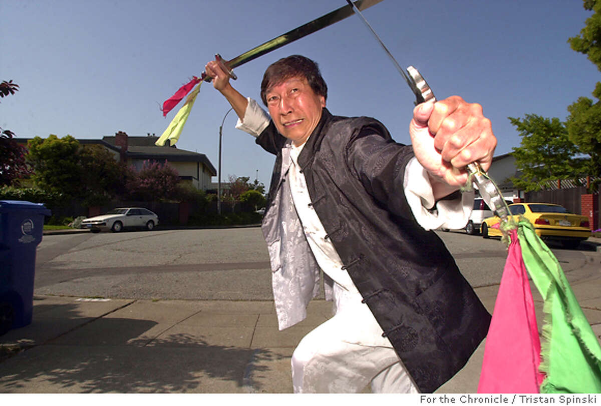 Grandmaster Chiu Chi Ling, 62, demonstrates his kung fu swordplay expertise in his driveway in Alameda. The Hong Kong native has lived and taught martial arts in the Bay Area for the past 7 years and stars in Kung Fu Hustle -- due out April 22.