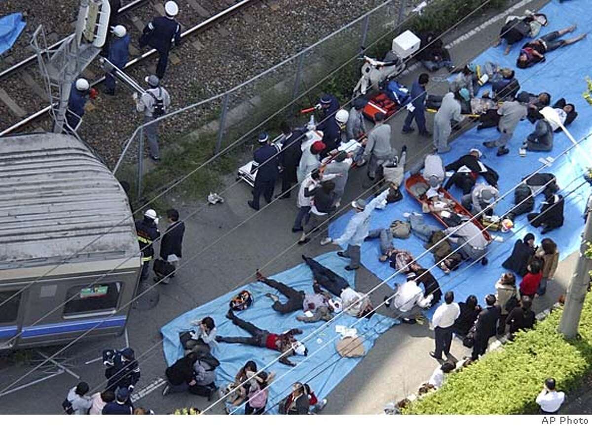 At least 73 dead in Japan rail crash / 7-car train slammed into ...