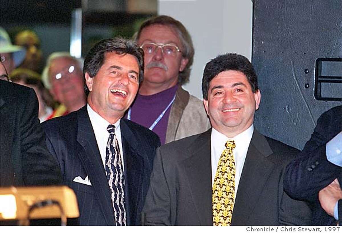 49ERS 2/C/04MAR97/CD/CS - San Francisco 49ers team president Carmen Policy (L) and owner Eddie DeBartolo smile during a rally to drum up interest in building a new 49ers stadium. SAN FRANCISCO CHRONICLE PHOTO BY CHRIS STEWART ALSO RAN: 9/4/98, 2/25/99, 3/5/999 CA