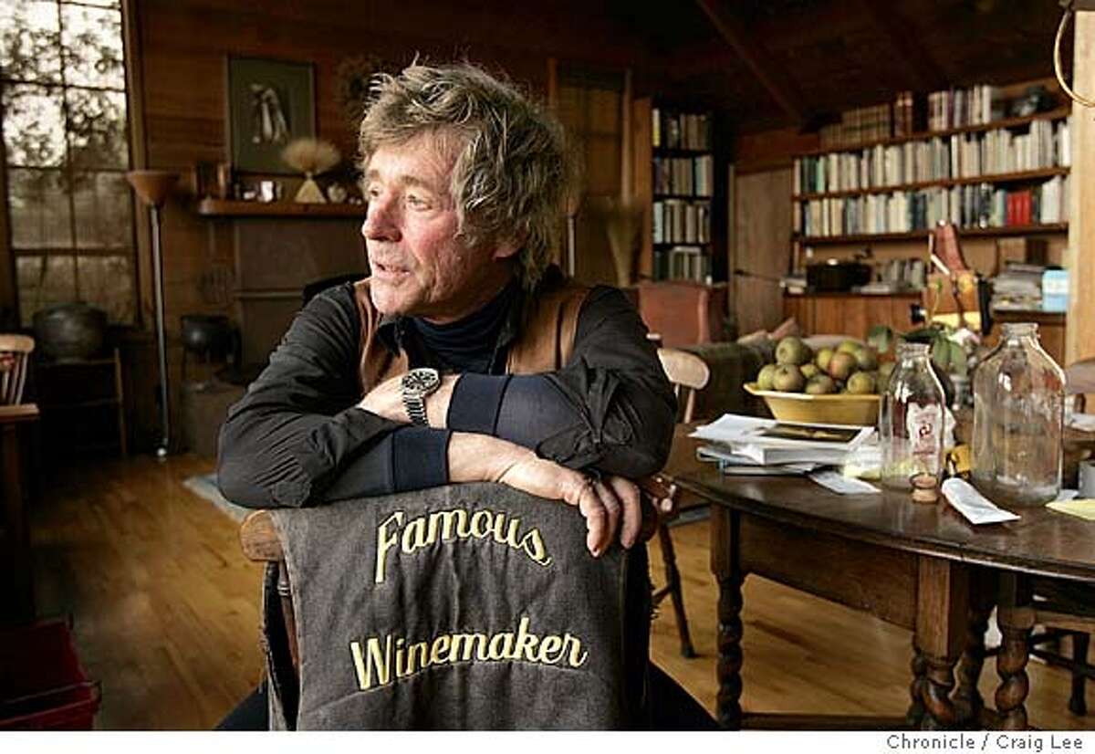Wine story profile on Sean Thackrey, who used to own an art gallery in San Francisco andis now a small, idiosyncratic and succesful winemaker working way off the beaten path at his home in Bolinas. Photo of Sean Thackrey with his "Famous Winemaker" jacket, inside his home. Event on 10/14/04 in Yountville. Craig Lee / The Chronicle