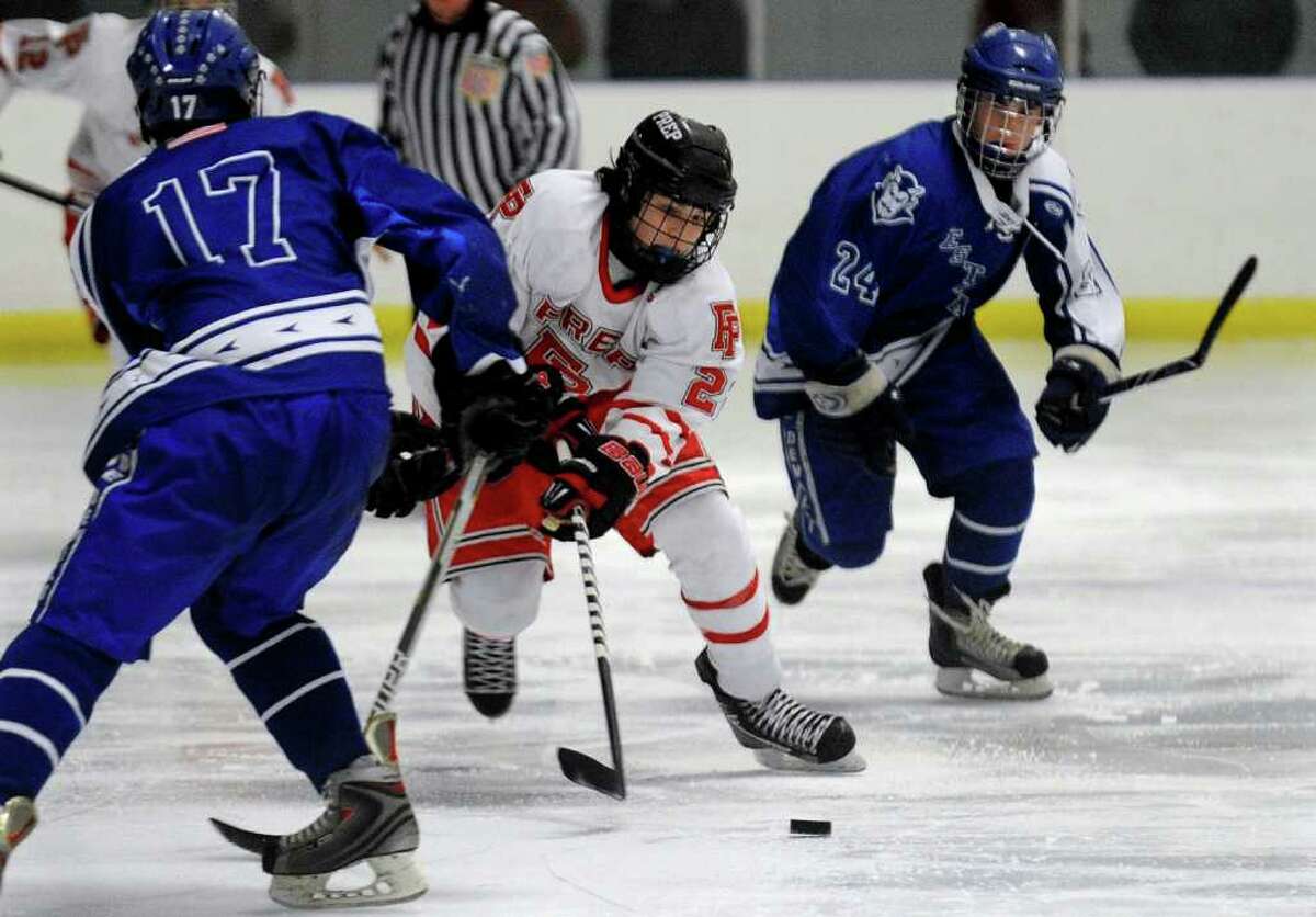 Fairfield Prep's #2 Andrew Hatton drives the puck, during boys hockey action against West Haven in Bridgeport, Conn. on Wednesday January 18, 2012.