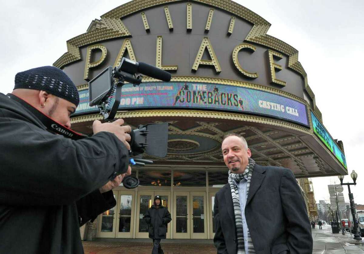 Schoen LaBombard, former bobsledder and a recovering addict who has been in and out of prison films for a reality TV show about recovering addicts with his director Jad El'Esencio (at left) at the Palace Theater in Albany Tuesday Jan. 17, 2012. (John Carl D'Annibale / Times Union)