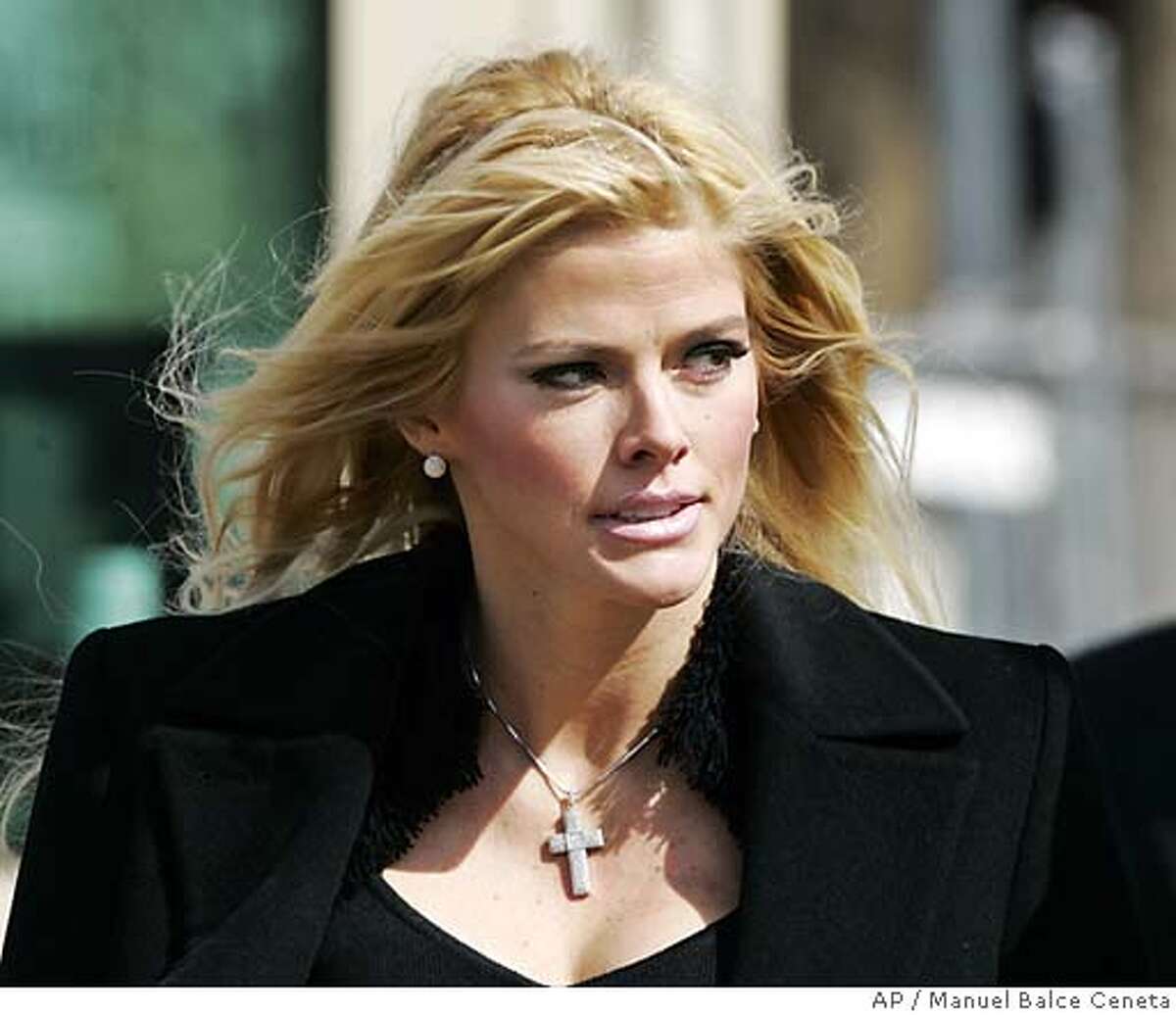 **FILE**Anna Nicole Smith, leaves the U.S. Supreme Court after he bid to collect millions of dollars from the estate of J. Howard Marshall II was presented on Feb. 28, 2006, in Washington. The court ruled Monday, May 1, 2006, that the one-time stripper and Playboy Playmate could pursue part of her late husband's oil fortune.(AP Photo/Manuel Balce Ceneta) Ran on: 05-02-2006 Anna Nicole Smith says her late husband planned to give her half his oil money. Ran on: 05-02-2006 Anna Nicole Smith says her late husband planned to give her half his oil money. Ran on: 02-23-2007 Judge Larry Seidlin awards custody of Anna Nicole Smiths body to Richard Millstein, who is representing her baby daughter, Dannielynn. Ran on: 02-23-2007 Judge Larry Seidlin awards custody of Anna Nicole Smiths body to Richard Millstein, who is representing her baby daughter, Dannielynn. A FEB 28 2006 FILE PHOTO