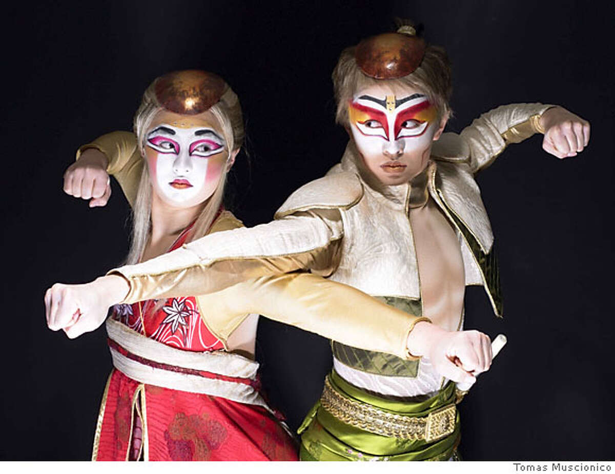 Jennifer Haight (left) and Cheri Haight (right) portray the principal characters of the Imperial war-torn twins in K� by Cirque du Soleil, performing at the MGM Grand in Las Vegas, Credit: Tomas Muscionico