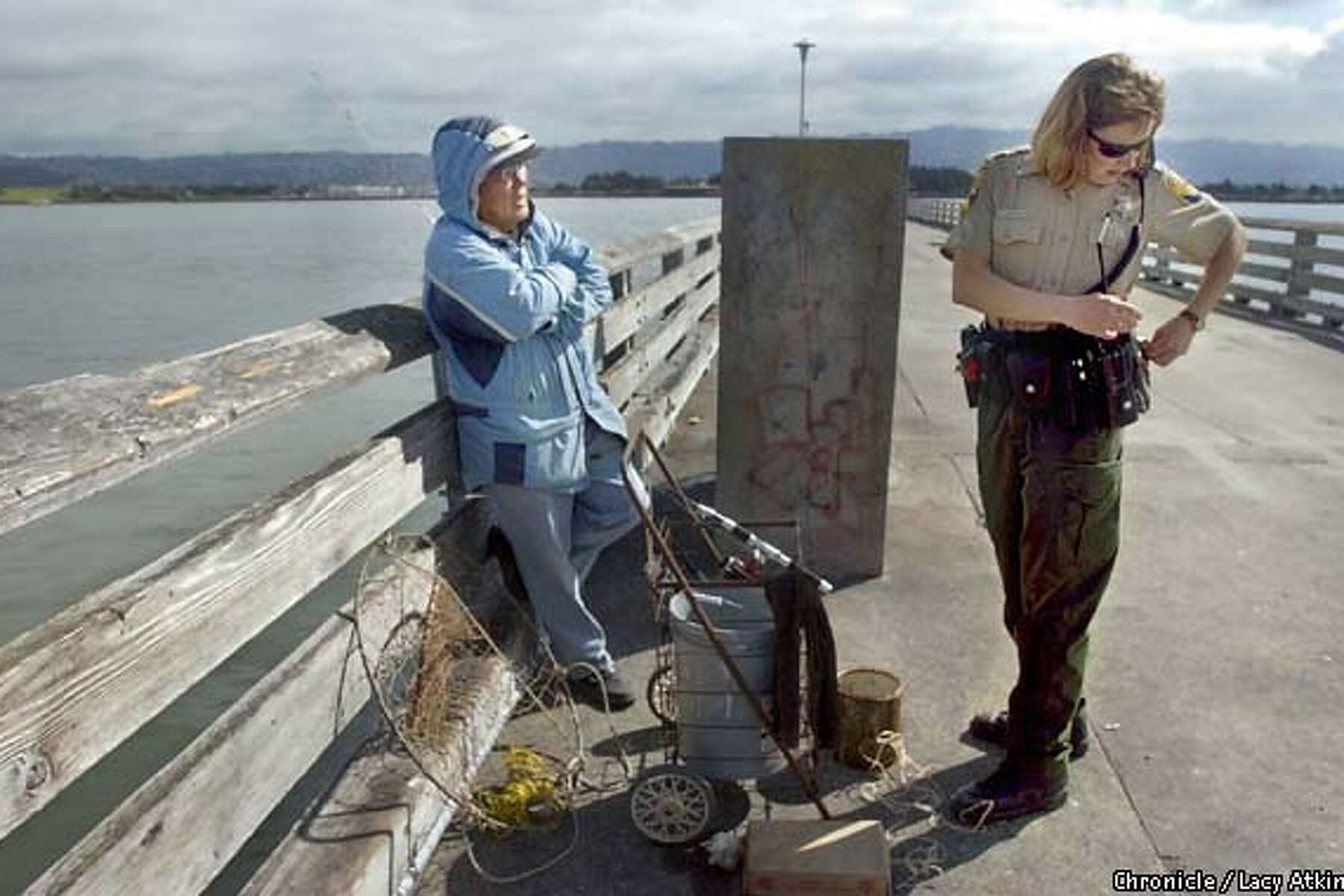 Wildlife watchdog / Fish and game warden is committed to her job despite  shrinking turf, pay