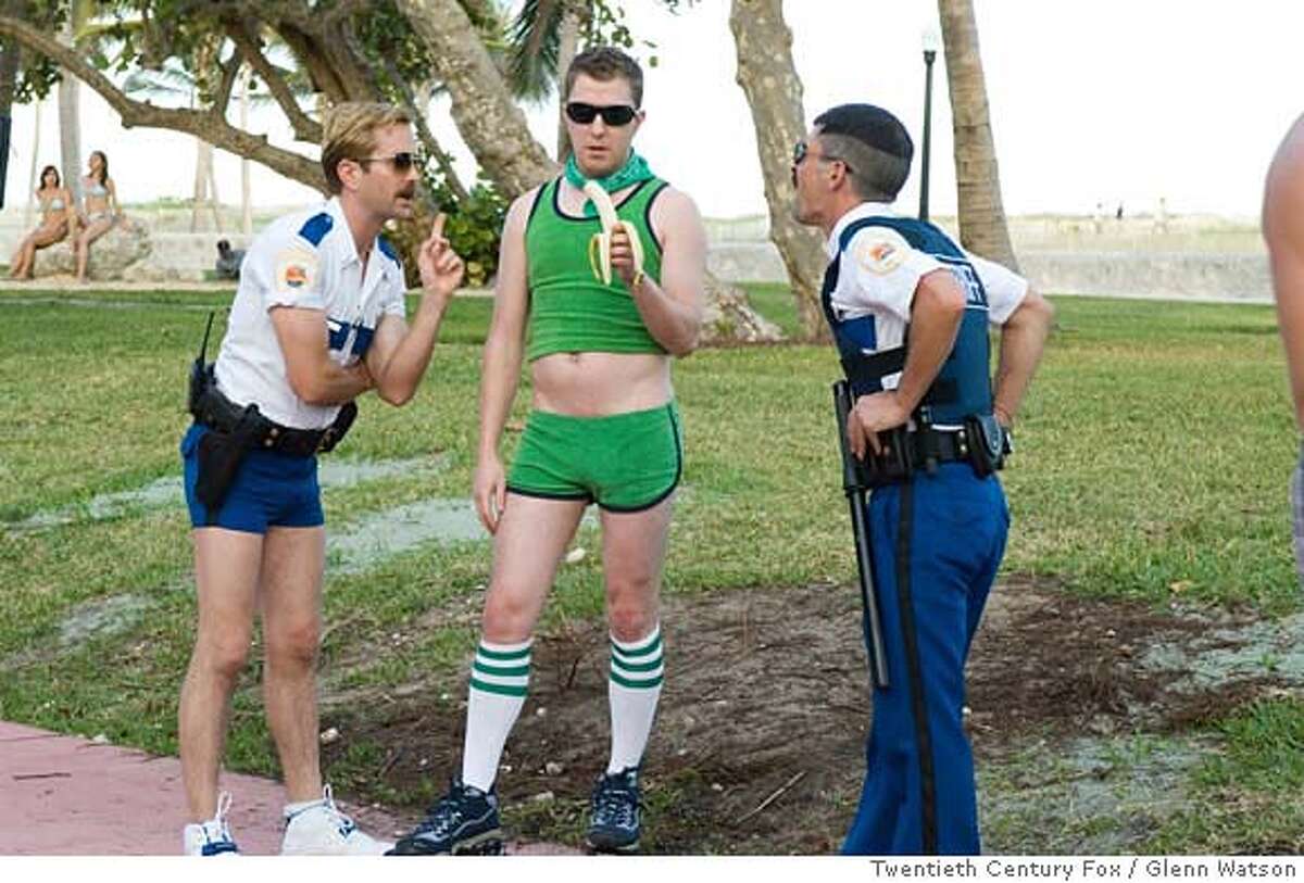 R-52 In Miami, Lt. Jim Dangle (Thomas Lennon, left) and Dep. Travis Junior (Robert Ben Garant) encounter an old �friend� from Reno: Terry (Nick Swardson). for movies23
