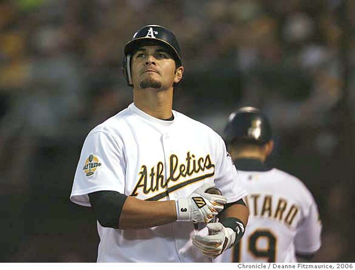 athletics_alcs1_df12 Eric Chavez strikes out in the bottom of the fourth inning. The Oakland Athletics play the Detroit Tigers in game one of the American League Championship Series. Event on Tuesday, October 10, 2006 at McAfee Coliseum in Oakland, California. Deanne Fitzmaurice / The Chronicle Ran on: 10-11-2006 Eric Chavez failed to do much at the plate Tuesday, an effort that included striking out with runners at second and third. Ran on: 10-11-2006 MANDATORY CREDIT FOR PHOTOG AND SF CHRONICLE/NO SALES-MAGS OUT