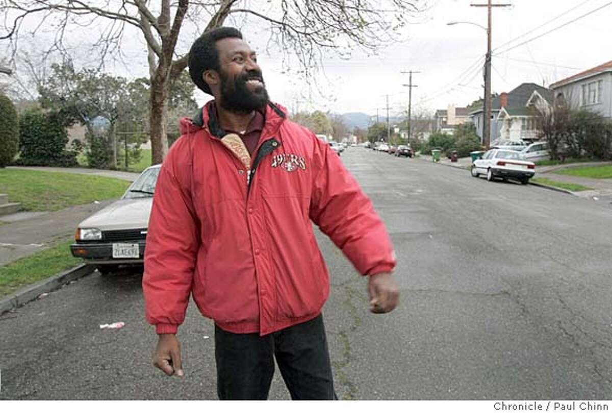 Patrick McCullough smiles at a construction worker renovating a house next door to his 59th Street home in Oakland, Calif. on 2/17/06. One year ago McCullough shot and wounded 16-year-old Melvin McHenry after he was threatened by a group of alleged drug dealers in front of his home. PAUL CHINN/The Chronicle MANDATORY CREDIT FOR PHOTOG AND S.F. CHRONICLE/ - MAGS OUT