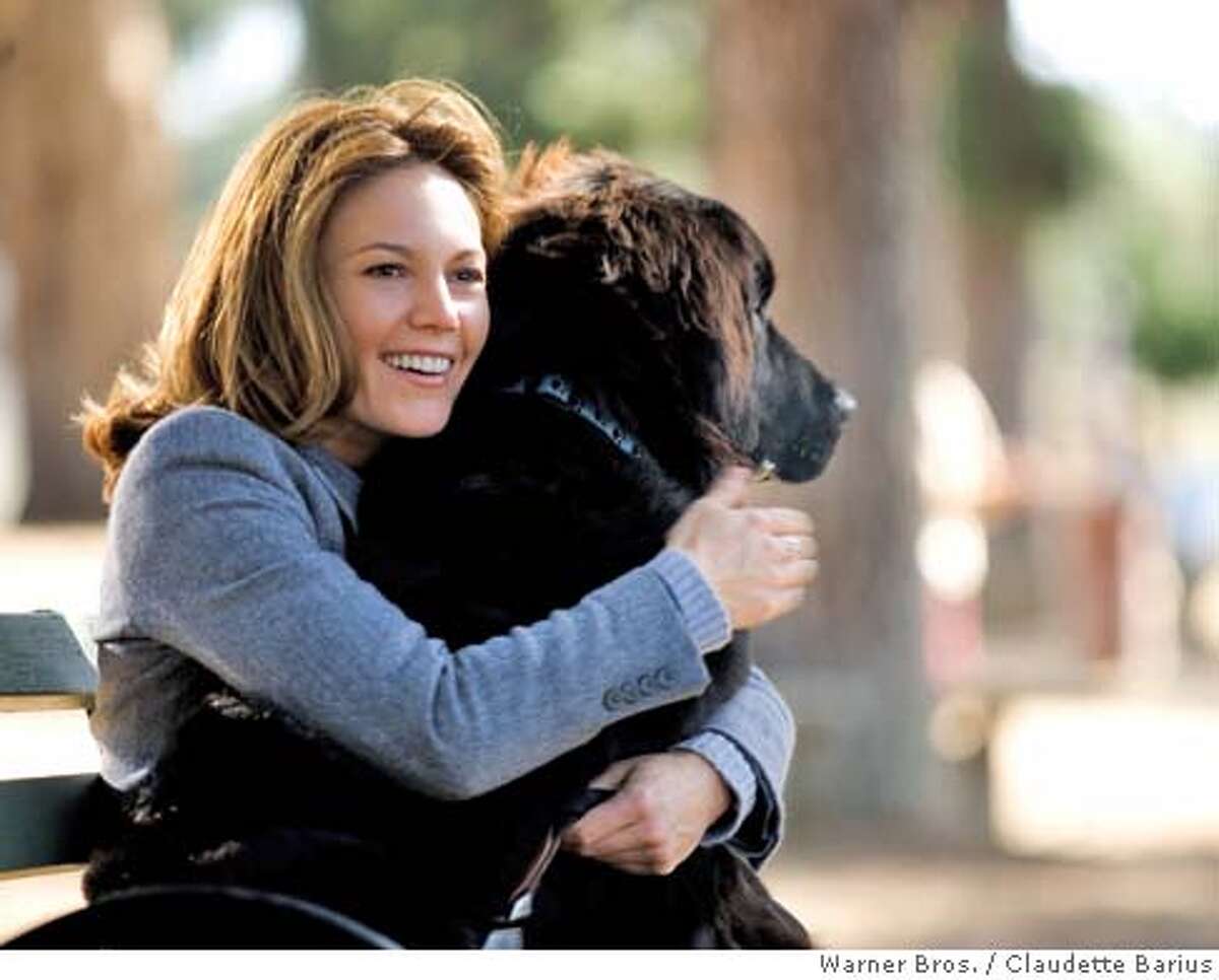 Actors Diane Lane is shown in an undated publicity photo released July 26, 2005 in a scene from her new film "Must Love Dogs". Lane plays a woman feigning her love of dogs to meet the perfect man. The film opens in the U.S. July 27, 2005.Claudette Barius/Warner Bros/Handout