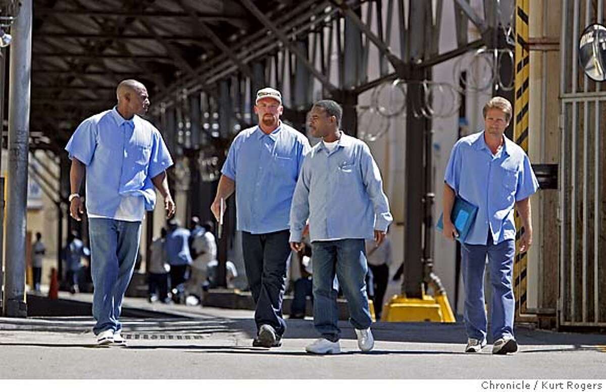San Quentin inmates Abraham (would not give last name) 36, Robert Frye 35, Olish Tunstall 39 and P.J. (would not give last name and P.J. is a nickname) 44, are all serving a life term with the possibility of parole takes part in the program tutors and students. They were walking toward the education department inside San Quentin. Inmates at San Quentin had a "bake sale" for literacy?!? Yep. The members of San Quentin's inmate-to-inmate tutoring program sold food to raise money in support of literacy, and are poised to hand a $1,000 check over to the ailing Salinas Free Library (and another $500 for literacy services in Marin SANQUENTIN20_0054_kr.JPG 7/19/05 in SAN QUENTIN,CA. KURT ROGERS/THE CHRONICLE MANDATORY CREDIT FOR PHOTOG AND SF CHRONICLE/ -MAGS OUT