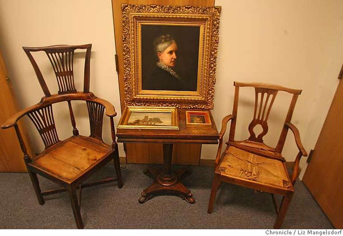 The recovered stolen painting, valued at $1 million, center, with the other recovered stolen property, including 2 other paintings and two antique chairs. Photographed in the Hall of Justice, Burglary division on Jan. 22, 2007. Liz Mangelsdor/San Francisco Chronicle