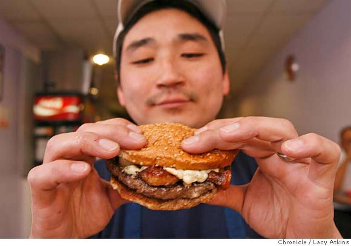 Pearl's Deluxe Burgers, is your basic burger joint with a special Prized Pearl burger (with bacon, blue cheese, etc.) and owner John Yee, Wednesday January 10, 2007 inSan Francisco,Ca. (Lacy Atkins/The Chronicle) MANDATORY CREDITFOR PHOTGRAPHER AND SAN FRANCISCO CHRONICLE/ -MAGS OUT