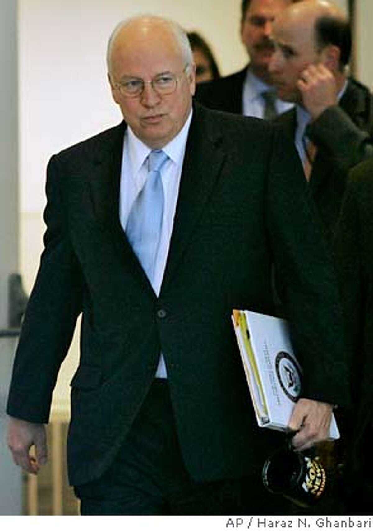 Vice President Dick Cheney leaves after an interview with Fox News Sunday at their offices in Washington Sunday, Jan. 14, 2007. Cheney said that congressional opposition will not influence President Bush's plans to send more troops to Iraq. "The president is the commander in chief. He's the one who has to make these tough decisions," Cheney said during the interview. (AP Photo/Haraz N. Ghanbari)