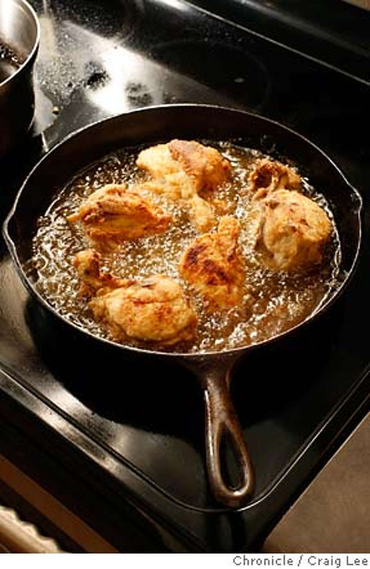 CHICKEN17_085_cl.JPG Photo for story on fried chicken. Food photo styled by Amanda Gold. Photo of "Best Way Chicken" in the frying pan. Event on 1/5/07 in San Francisco. photo by Craig Lee / The Chronicle
