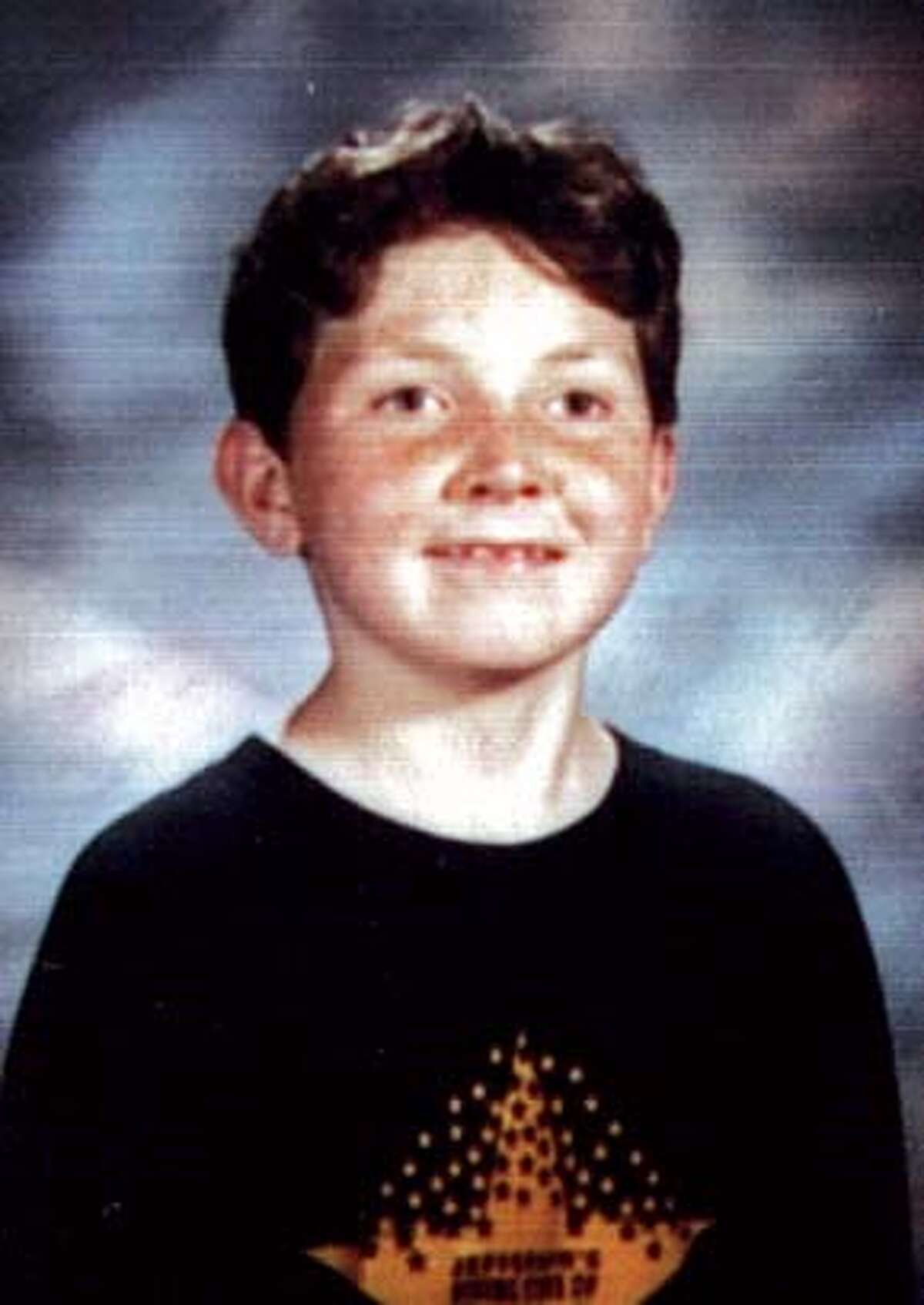 MANDATORY CREDIT FOR PHOTOG AND SF CHRONICLE/ -MAGS OUTDOGMAUL_125_MJM.jpg A school portrait of Nicholas Scott Faibish who was a 6th grader at Roosevelt Middle School. A 12-year-old boy, Nicholas Scott Faibish was mauled to death by his family's two pit bulls this afternoon in his apartment in San Francisco's Inner Sunset District as his mother screamed helplessly. The boy was attacked at 711 Lincoln Way across from Golden Gate Park about 3:15 p.m., police said. He was with his mother and two siblings when the 80-pound dogs -- a male named Rex and a female named Ella -- attacked him.