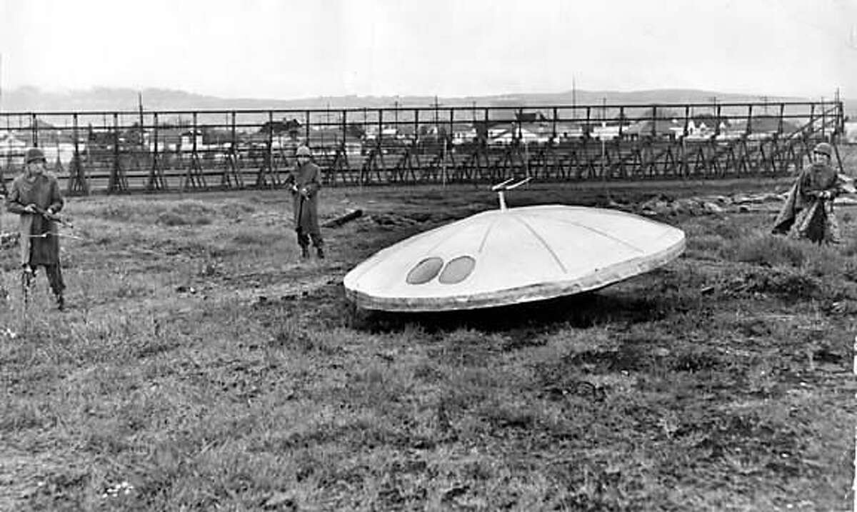 3 National Guardsmen and flying saucer in vacant lot near Bay Farm island. April 8, 1950 From the Chronicle Archive Library