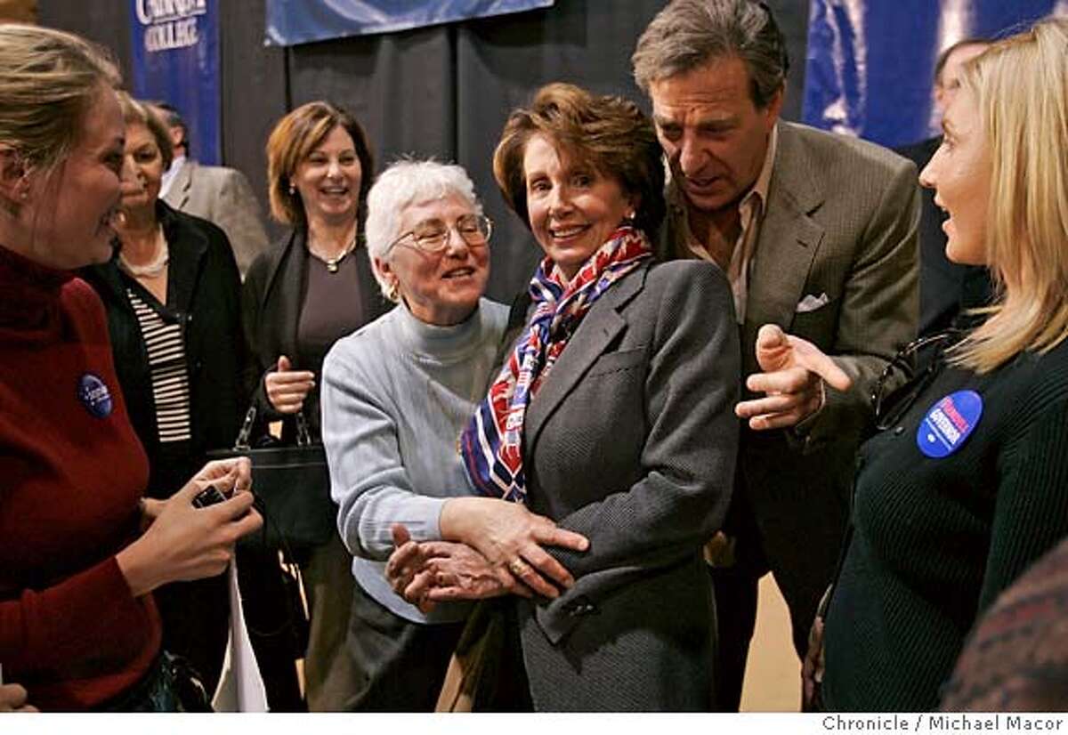 pelosi_246_mac.jpg Paul Pelosi leans into his wife Nancy as she poses for photographs with supporters a week before the November elections. Democratic Leader, Congresswoman Nancy Pelosi, D. San Francisco, makes a trip across the Southeastern section of Pennsylvania, on a "Get Out The Vote" campaign, stumping for local Democratic candidates. Event in, , Pa, on 11/4/06. Photo by: Michael Macor/ San Francisco Chronicle Mandatory credit for Photographer and San Francisco Chronicle / Magazines Out
