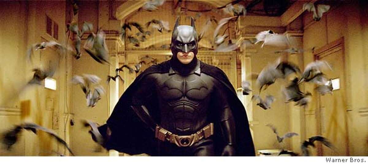 Actor Christian Bale, shown in this undated publicity photograph, stars as Batman in a scene from Warner Bros. Pictures' action adventure film "Batman Begins" which opens in the United States on June 15, 2005. NO ARCHIVES NO THIRD PARTY SALES Warner Bros./Handout 0