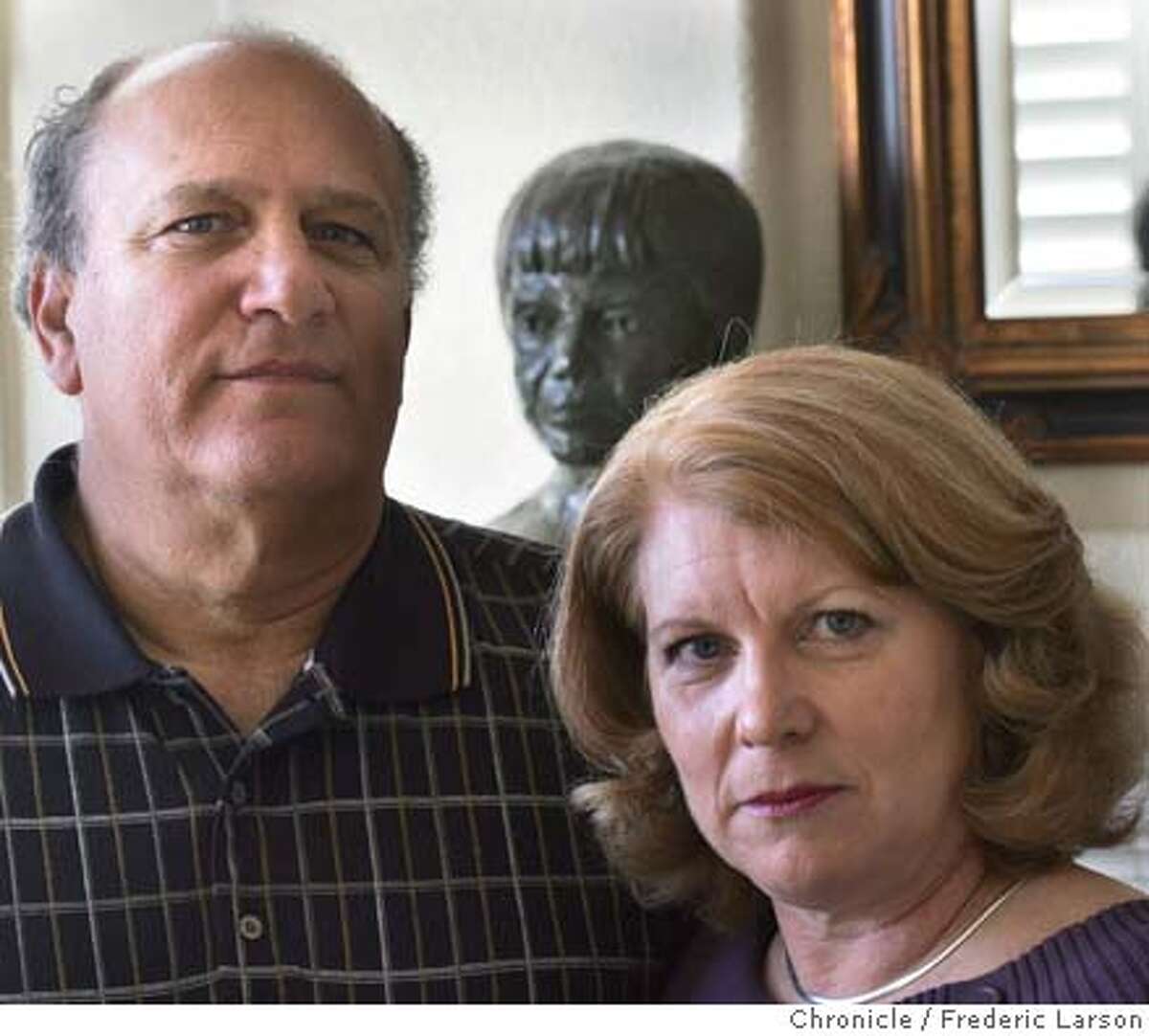 STEROIDS_102_fl.jpg Denise and Ray Garibaldi of Petaluma lost their son Rob (Rob busted in background) who was a top-level prospect for professional baseball but spiraled amid use of steroids. 11/22/04 Petaluma CA Frederic Larson The San Francisco Chronicle