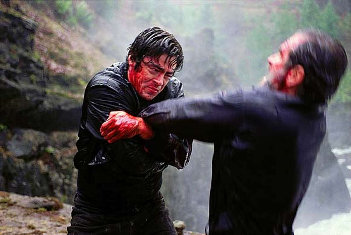 THIS IS A HANDOUT IMAGE. PLEASE VERIFY RIGHTS. (Left to right) Benicio Del Toro as Aaron Hallam and Tommy Lee Jones as L.T. Bonham in �The Hunted.� Paramount Pictures presents, in association with Lakeshore Entertainment, a Ricardo Mestres/Alphaville Production. A William Friedkin Film starring Tommy Lee Jones and Benicio Del Toro. The film is directed by William Friedkin.