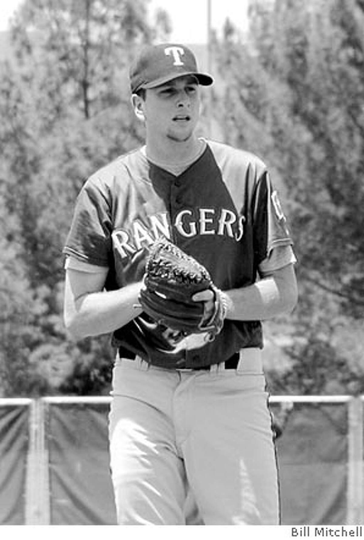 Scott Feldman of Burlingame, a former College of San Mateo standout, pitches for the Texas Rangers' AA team. Photo by Bill Mitchell