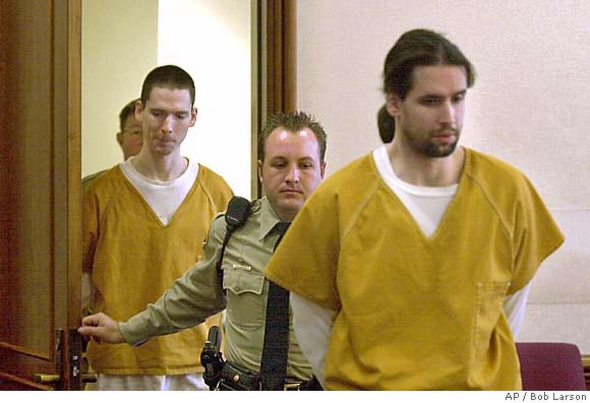 Brothers Justin Helzer, 29, left, and Glenn Helzer, 31, are led into court for a preliminary hearing in Martinez, Cailf., Monday Dec. 3, 2001. The Helzers and their housemate Dawn Godman, 27, are accused of going on a killing spree that left five people dead including Selina Bishop, the daughter of blues guitarist Elvin Bishop. (AP Photo/Contra Costa Times, Bob Larson ) Ran on: 06-10-2004 Carma Helzer leaves the Martinez Courthouse after her sons arraignment. Ran on: 06-24-2004 Justin Helzer Ran on: 11-09-2004 Glenn Helzer entered a surprise guilty plea earlier this year just before he was to be tried. PLEASE CREDIT THE CONTRA COSTA TIMES MAGS OUT