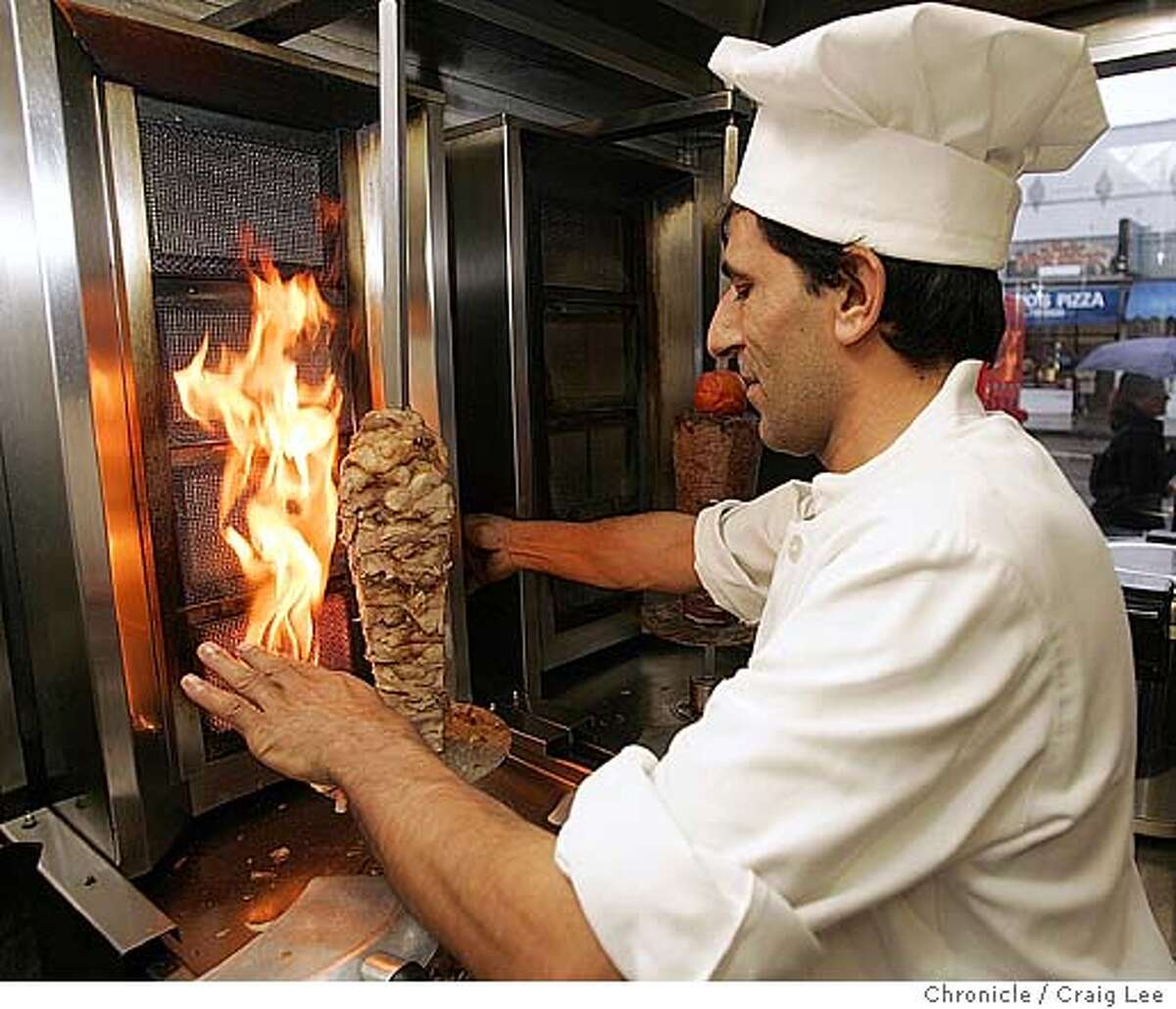 Alaturka restaurant at 869 Geary street near Larkin. They serve Turkish cuisine. Photo of chef, Naim Sit, roasting chicken doner. Event on 12/9/04 in San Francisco. Craig Lee / The Chronicle