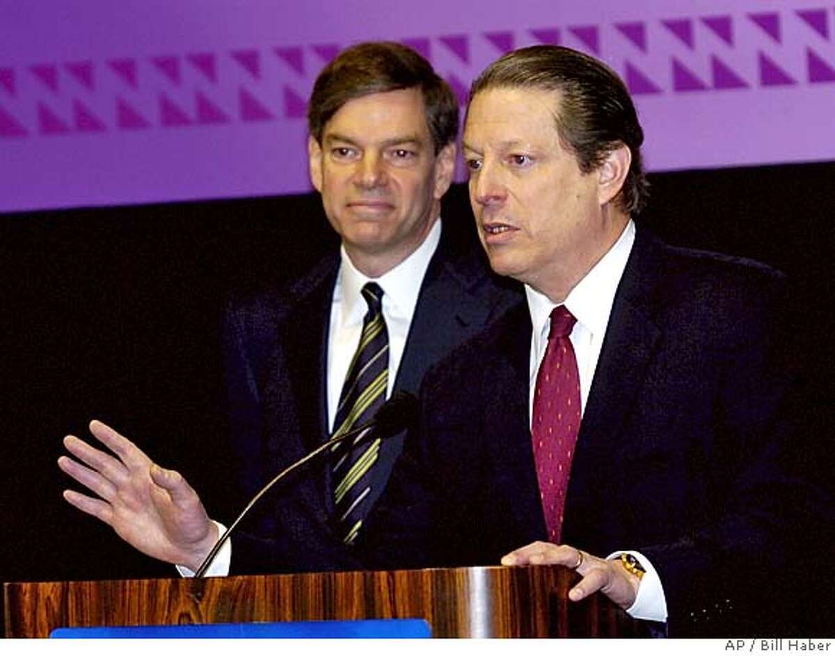 Former Vice President Al Gore and business partner Joel Hyatt, left, answer questions at a news conference New Orleans Tuesday, May 5, 2004. Gore announced he and a group of investors were launching an independent cable televison network. Gore said the network will be "an independent voice in this industry" with a primary target audience of people between 18 and 34 "who want to learn about the world in a voice they recognize and a view they recognize as their own." (AP Photo/Bill Haber)