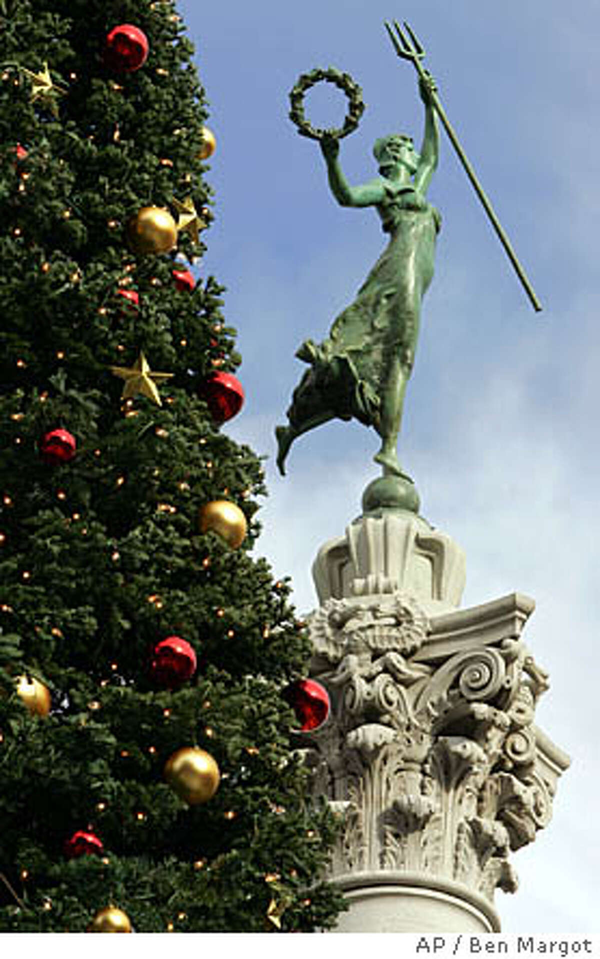 A decorated holiday tree is displayed in San Francisco's Union Square shopping district, Monday, Nov. 29, 2004, in San Francisco. (AP Photo/Ben Margot) Ran on: 12-05-2004 A decorated holiday tree is displayed in San Franciscos Union Square.