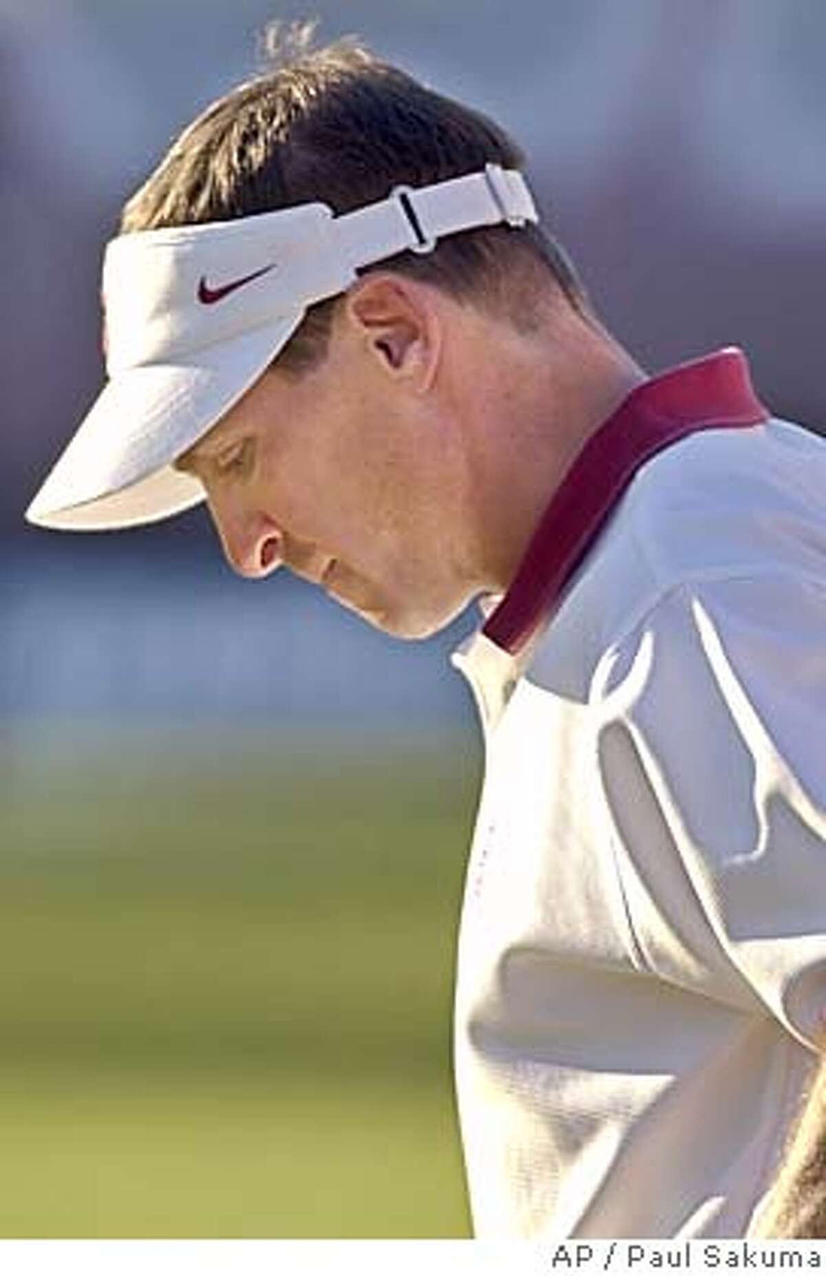 Stanford head coach Buddy Teevens looks down in the last minute of Stanford's 36-11 lost to Washington State, Saturday, Oct. 12, 2002 in Stanford, Calif. (AP Photo/Paul Sakuma) sports color skybox please expedite Projects#Sports#Chronicle#11/29/2004#ALL#5star#C1#421801417