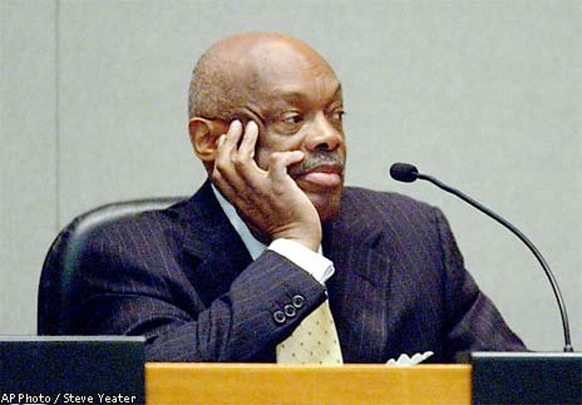 San Francisco Mayor Willie Brown watches as the California Public Employee's Retirement System board elects labor leader Sean Harrigan as the new president of CALPERS during a board meeting in Sacramento, Calif., on Thursday, Feb. 20, 2003. Brown was also nominated for the position to lead the nation's largest pension fund.(AP Photo/Steve Yeater)